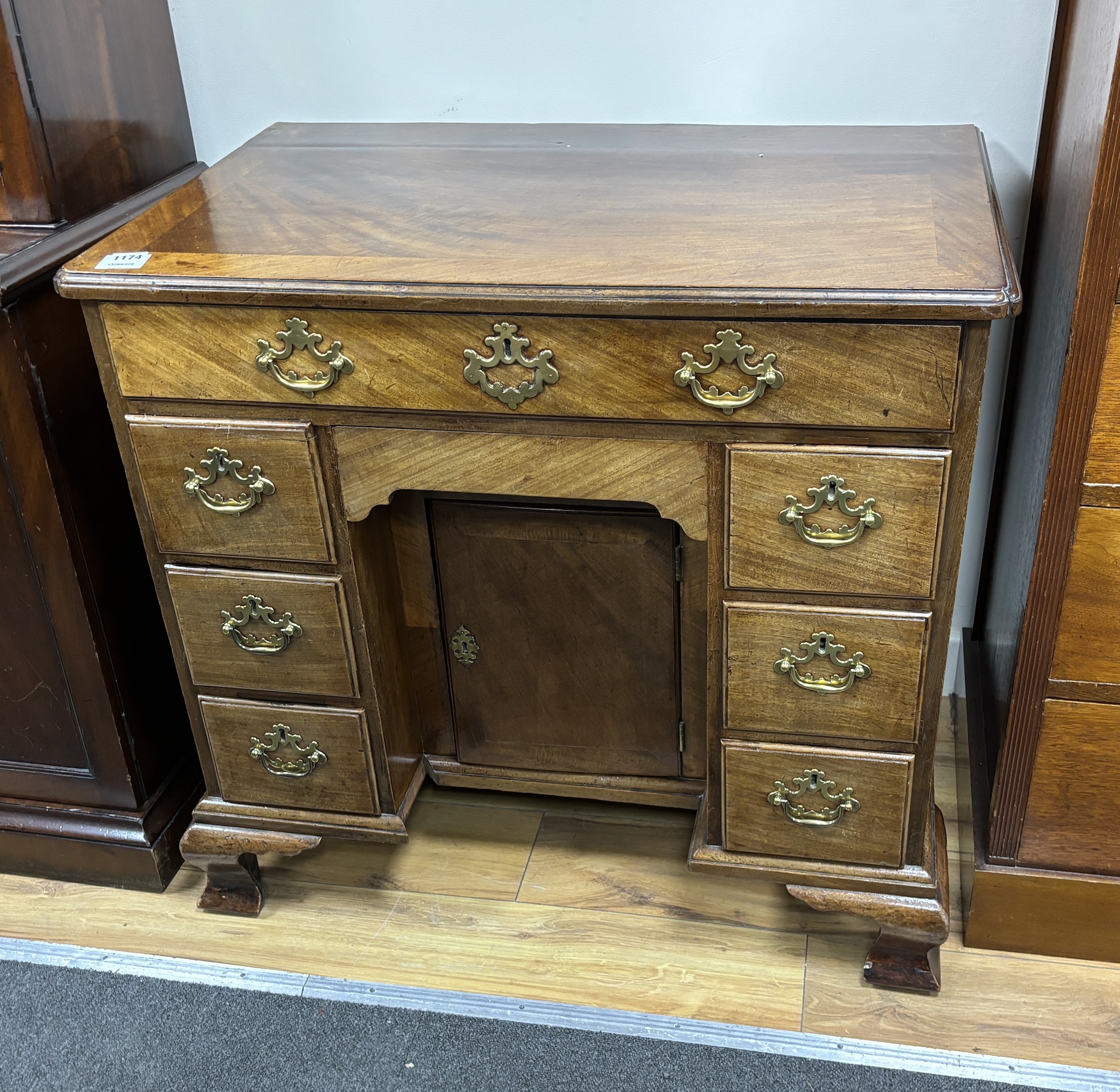 An 18th century mahogany kneehole desk, width 83cm, depth 52cm, height 76cm